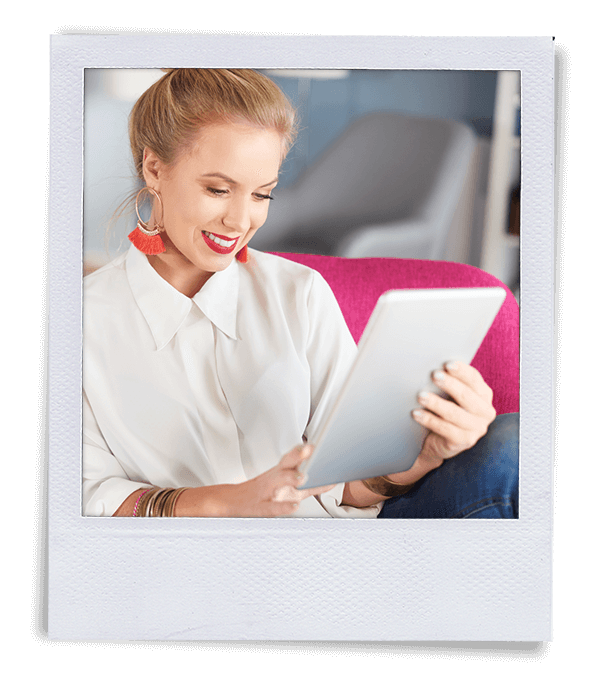 Polaroid of woman reading on an ipad